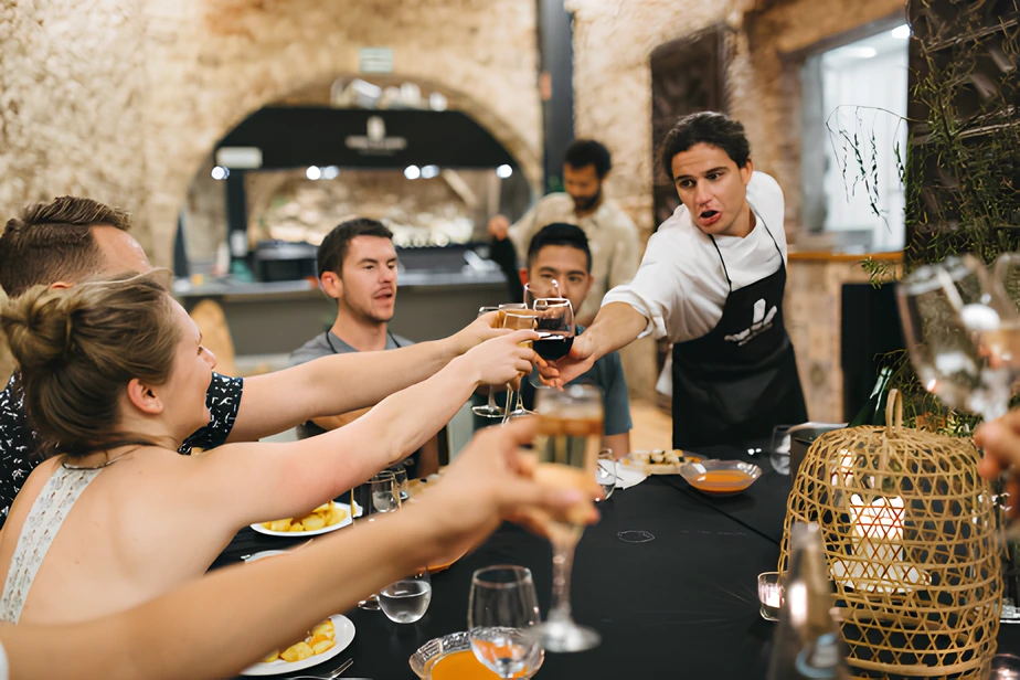 Guests toast at their private dinner